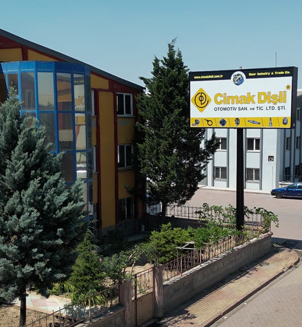 Company sign and the building with its coloured facade, closer view